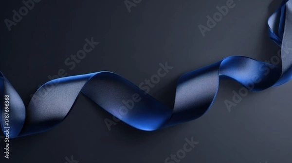Fototapeta flowing blue silk ribbon across dark gradient background with metallic tag, modern cyber monday promotional composition