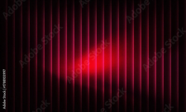 Obraz Vibrant red light beams through dark vertical blinds creating dramatic abstract background