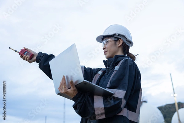 Fototapeta Engineer Monitoring Data at Natural gas plant