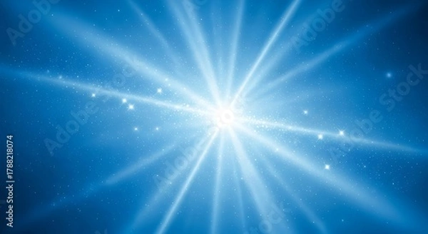Obraz Abstract Radiant Light Burst with Sparkling Dust on Blue Background