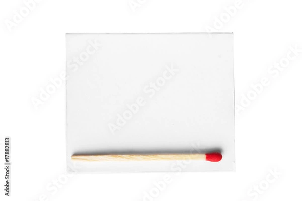 Fototapeta red match on a white box isolated on a white background.