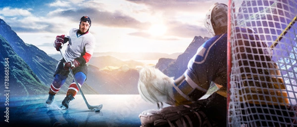 Obraz Hockey players in action on the ice. Outdoor game. Sports. Hockey match. A large hockey rink in the middle of an forest. Hockey concept. Panorama