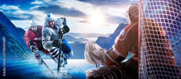 Obraz Hockey players in action on the ice. Outdoor game. Sports. Hockey match. A large hockey rink in the middle of an forest. Hockey concept. Panorama