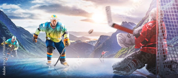 Obraz Hockey players in action on the ice. Outdoor game. Sports. Hockey match. A large hockey rink in the middle of an forest. Hockey concept. Panorama