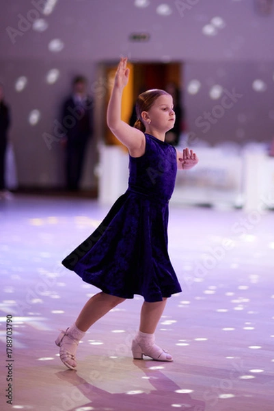 Fototapeta Children showcase skills at ballroom dance competition