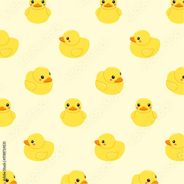 Obraz Seamless pattern of cute yellow rubber ducks on a light yellow background for children. Funny wallpaper with toys for the bathroom,