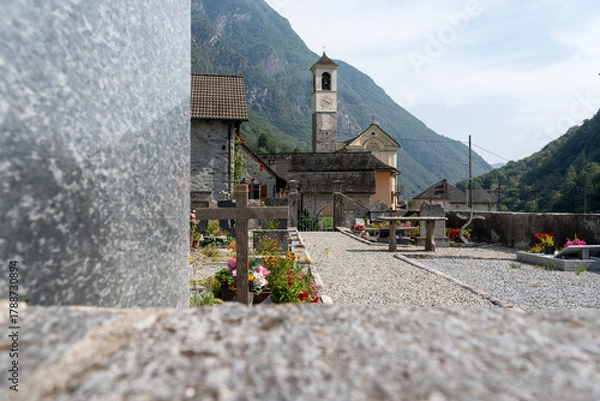 Fototapeta Lavertezzo, Switzerland - August 14, 2025: Beautiful village Lavertezzo and the crystal clear and calm waters of the Verzasca stream. A popular tourist destination in Ticino, Switzerland.