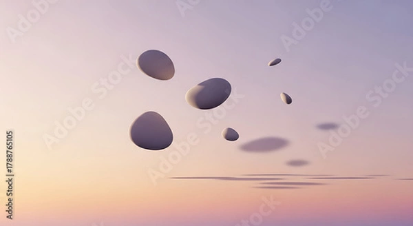 Fototapeta Abstract representation of floating smooth oval shapes casting subtle shadows on a soft, gradient background during a serene sunrise or sunset