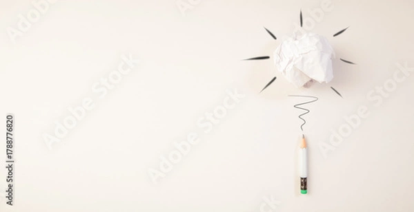 Fototapeta white blank paper sheet, crumpled paper ball and bulb with pencil on the wall. creative idea, inspiration, creativity, inspiration concept