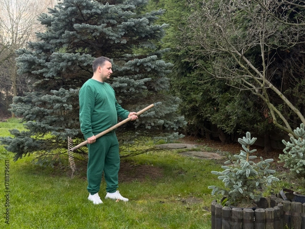 Obraz Man gardening in green attire