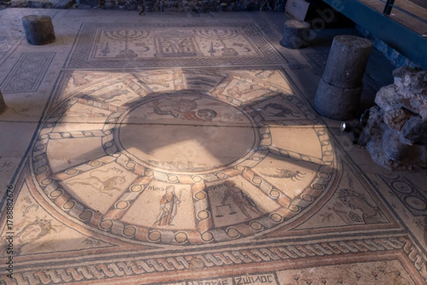 Obraz Tiberias, Israel, January 11 2025: Main mosaic floor of Hammat Tiberias synagogue with zodiac circle, panels, and lion motifs.  from the Hammat Tiberias Synagogue floor.