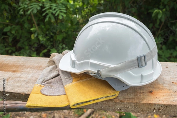 Fototapeta white safety helmet and Protective gloves