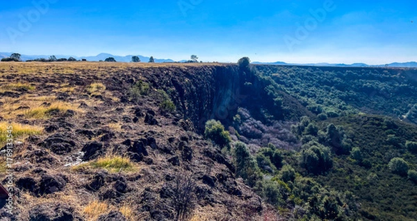 Fototapeta The Jamestown, California, valley looking down from Tabletop MountainThe Jamestown, California, valley looking down from Tabletop Mountain and the famous gold climbing wall where experts practice