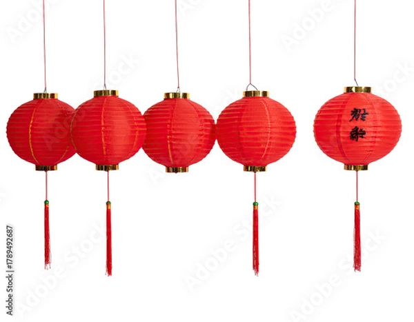 Fototapeta Five red spherical lanterns with tassels suspended against black