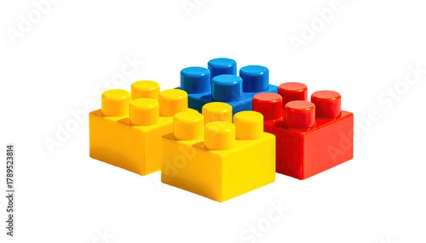 Fototapeta Three colorful building blocks isolated on a black background