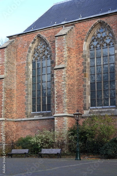 Fototapeta Pieterskerkhof Square with Benches and Church Windows in Leiden, Netherlands