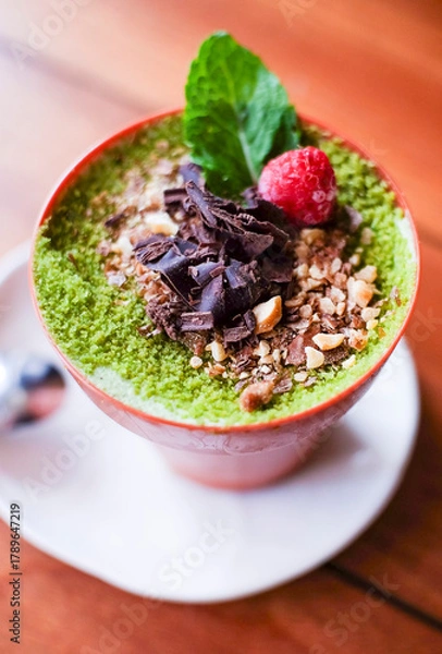 Fototapeta chocolate mousse with raspberry and mint