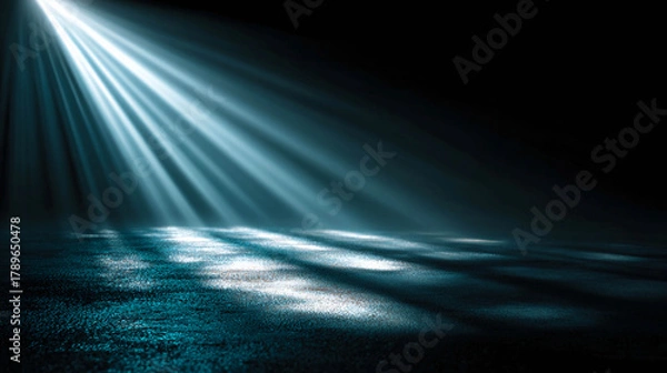 Obraz Blue-blue rays of light falling on the surface.