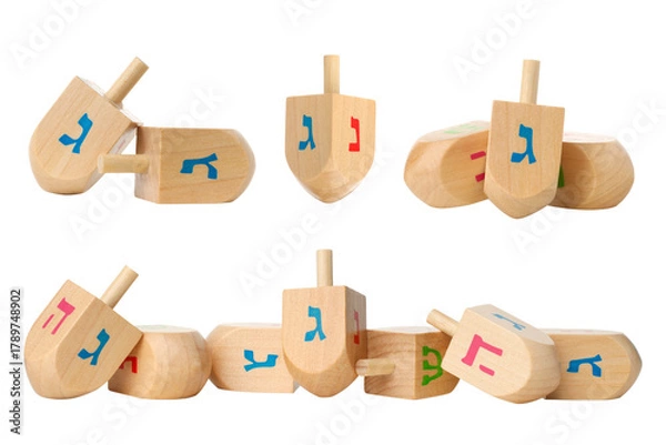 Fototapeta Set, Wooden dreidels in varied positions with colors, isolated, PNG
