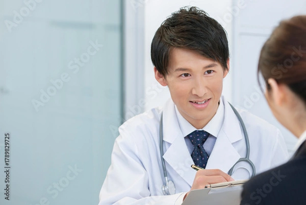 Obraz 問診をする医師