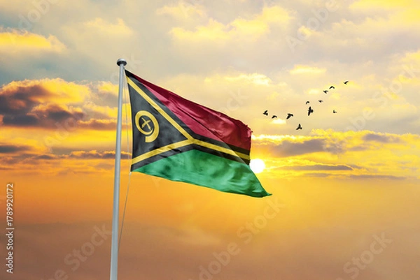 Obraz Vanuatu flag waving in sunset or sunrise. Vanuatu flag for Republic Day and Independence Day.
