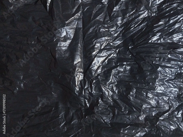 Fototapeta Shiny Black Garbage Bag Texture Background