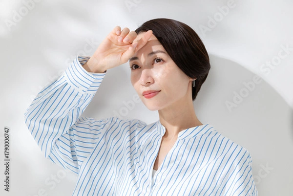 Obraz 日差しを浴びる女性