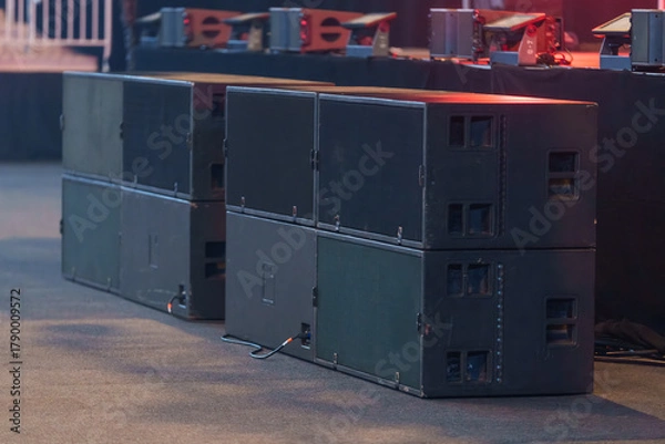 Fototapeta Large professional speakers positioned on the venue floor for powerful live sound during events