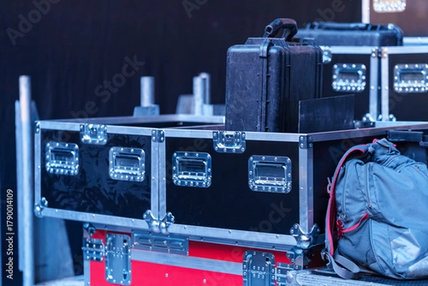 Fototapeta Concert gear boxes with wheels on the stage, used for transporting and protecting equipment during event setup