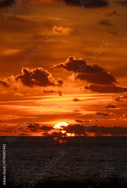 Fototapeta Sunset over the ocean