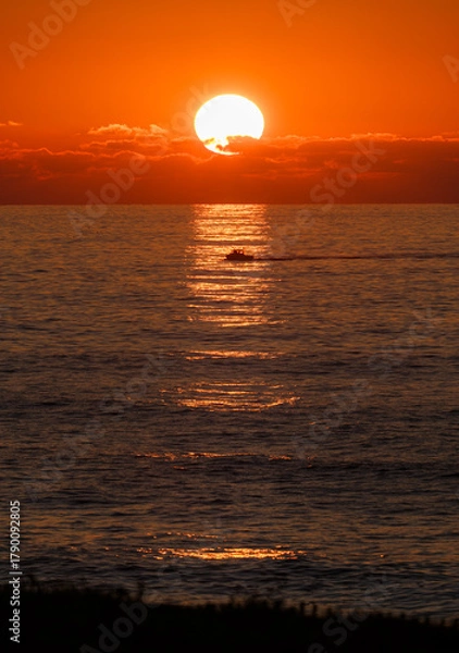 Fototapeta sunset over the sea