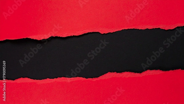 Obraz Torn red paper revealing black background in close-up view