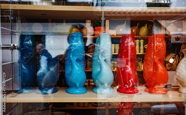 Fototapeta colourful vases in a shop window, France