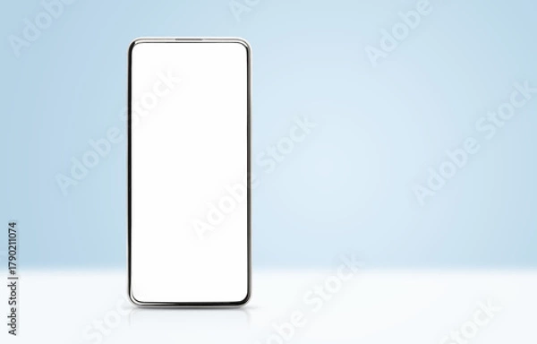 Fototapeta A smartphone with a white screen standing on a light blue background
