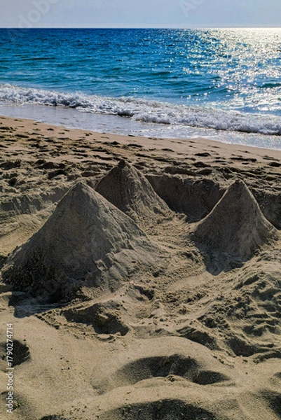 Obraz Pyramids made of sand on the beach
