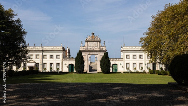Obraz Palácio de Seteais in Sintra, Portugal with neoclassical architecture, manicured gardens, and iconic triumphal arch under a clear blue sky