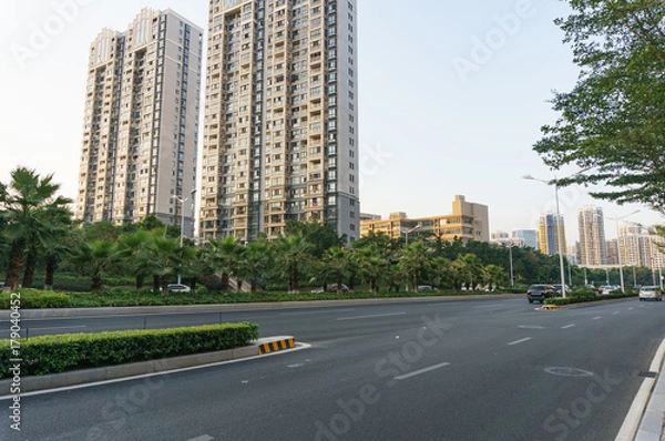 Obraz Road with modern building background during rush hour