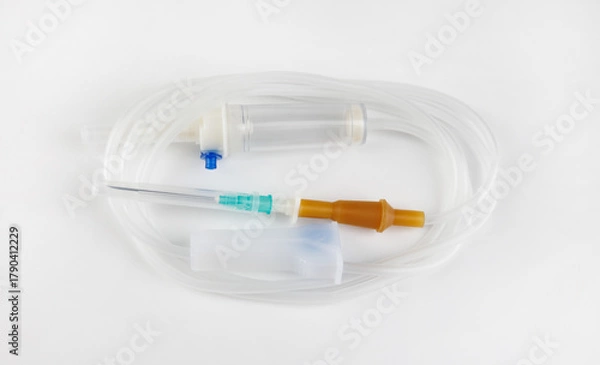 Fototapeta Infusion system for intravenous administration of drugs on a white background . IV Set Infusion .Intravenous drip system .