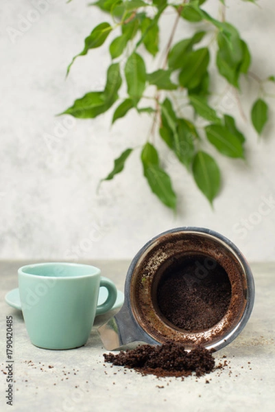 Fototapeta Cup of espresso and filter with coffee grounds, lifestyle concept, wake up in the morning, hot drink with caffeine, take a break