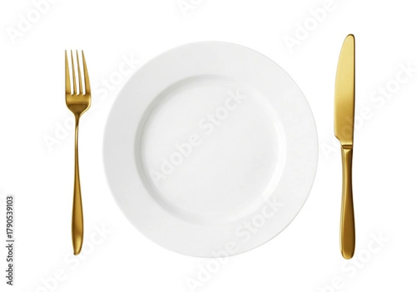 Obraz Gold fork and knife beside a white plate