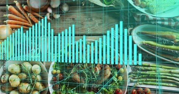 Fototapeta Displaying teal chart and grid overlaying veg spread on wood table, with roasted potatoes