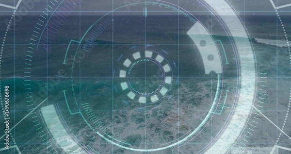 Fototapeta Overlaying circular HUD scanning coastal ocean from elevated view, showing reticle, breaking waves
