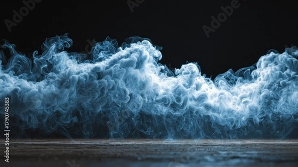 Fototapeta Wispy cloud rolls in a mystical display of smoke at the base, creating an ethereal atmosphere in low light conditions