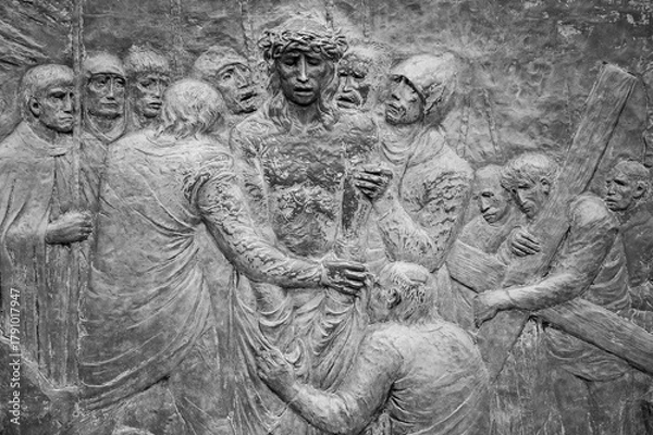 Obraz Station X: Jesus is stripped of his garments (Division of robes). The Way of the Cross on Mount Križevac (the Cross Mountain) in Medjugorje.