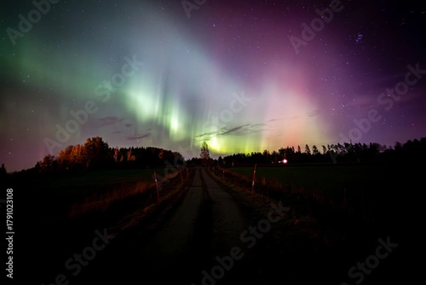 Obraz Scenic view of aurora borealis against sky at night