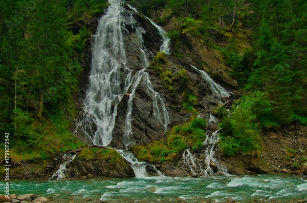 Fototapeta Waterfall Schleierwasserfall in the Osttirol region on a summer rainy day