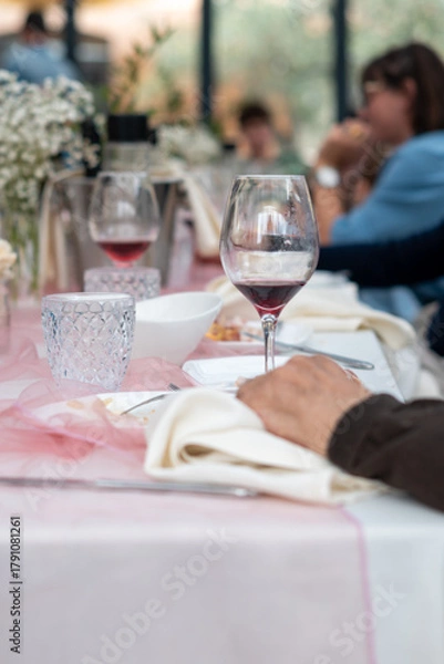 Fototapeta Elegantly Set Private Event Venue Ready for a Delicious Lunch Gathering Surrounded by Guests