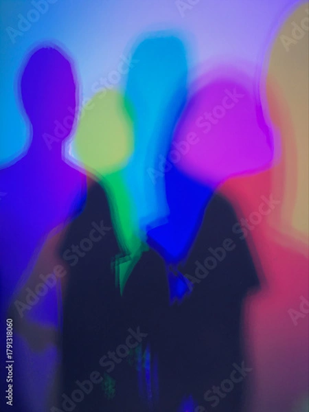 Obraz People silhouettes blending with colorful neon light blur