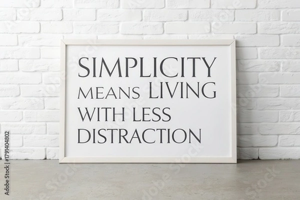 Obraz Framed text stating Simplicity Means Living With Less Distraction