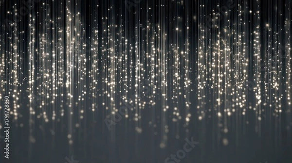 Fototapeta Glistening vertical lines of silver glitter fall gracefully, creating a stunning and enchanting display against a dark background in a festive setting